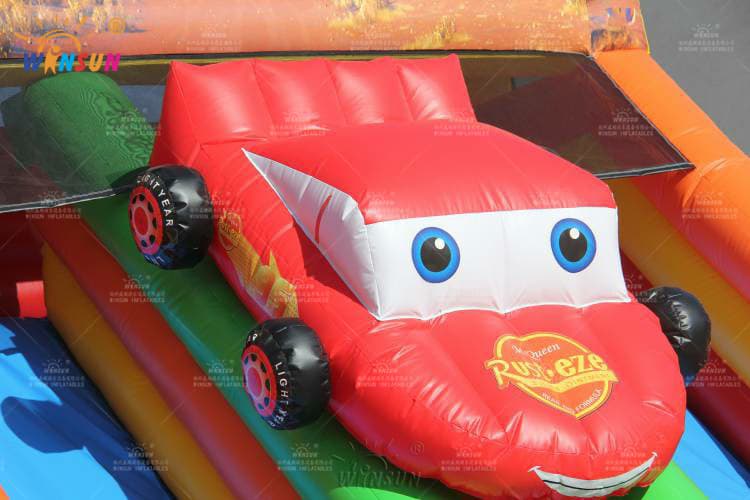Custom racing-themed inflatable slide with climbing wall factory direct