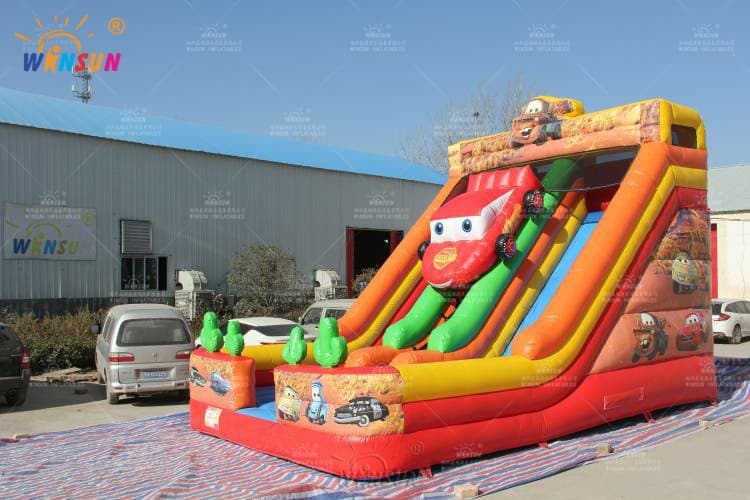 Dual lane racing inflatable slide with center climb