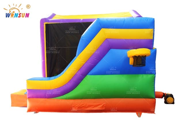 Backyard inflatable bounce house with slide and hoop for kids