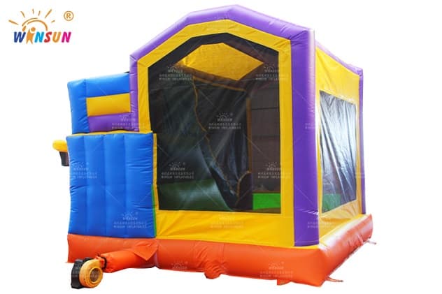 Best inflatable bounce house with shaded slide and basketball hoop for outdoor play