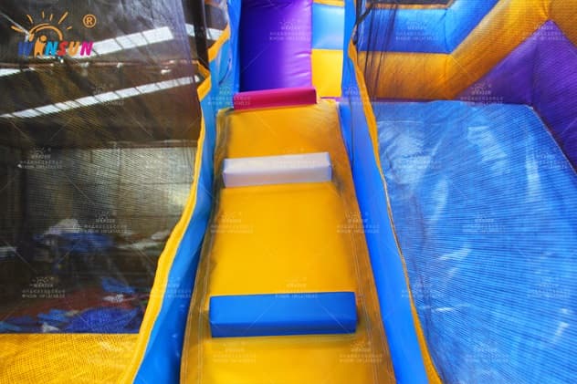 Multi-activity inflatable jumper with sun protection and games