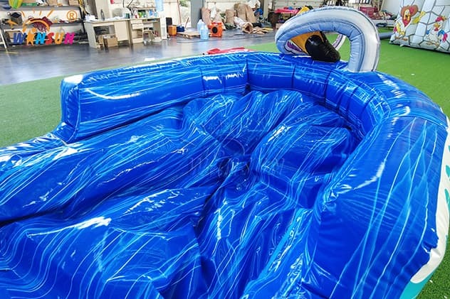 Heavy-duty outdoor octopus water slide with commercial blower setup